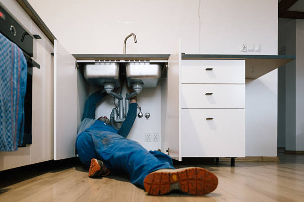 Professional Drain Cleaning technician working in Lowell, MI